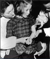 1946 ex-camp girl gets TB test - Credit c. UNICEF/UNRRA1663/Norman Weaver